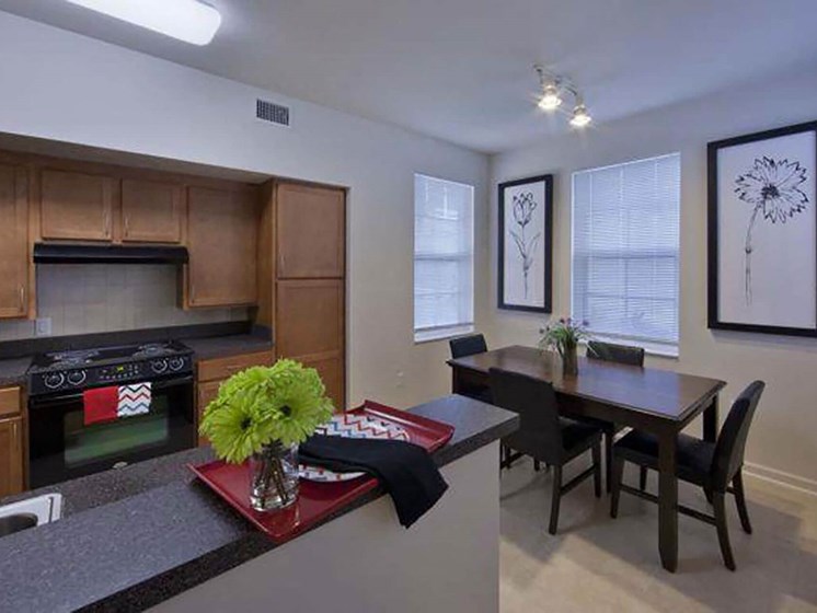 apartment kitchen and dining area_Northpark at Scott Carver Apartments Miami, FL