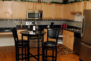 Furnished kitchen area Furnished kitchen area-Quimby Plaza Apartments Memphis, TN - Photo Gallery 4