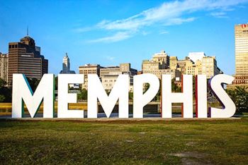 a view of the city with the letters memphis in the foreground