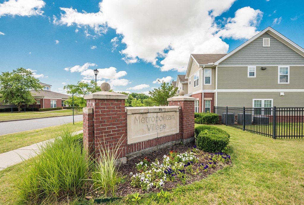 the preserve at meridian village sign in front of houses