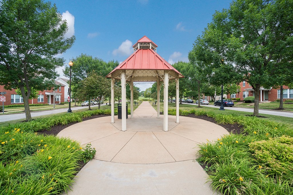 a gazebo in the middle of a park