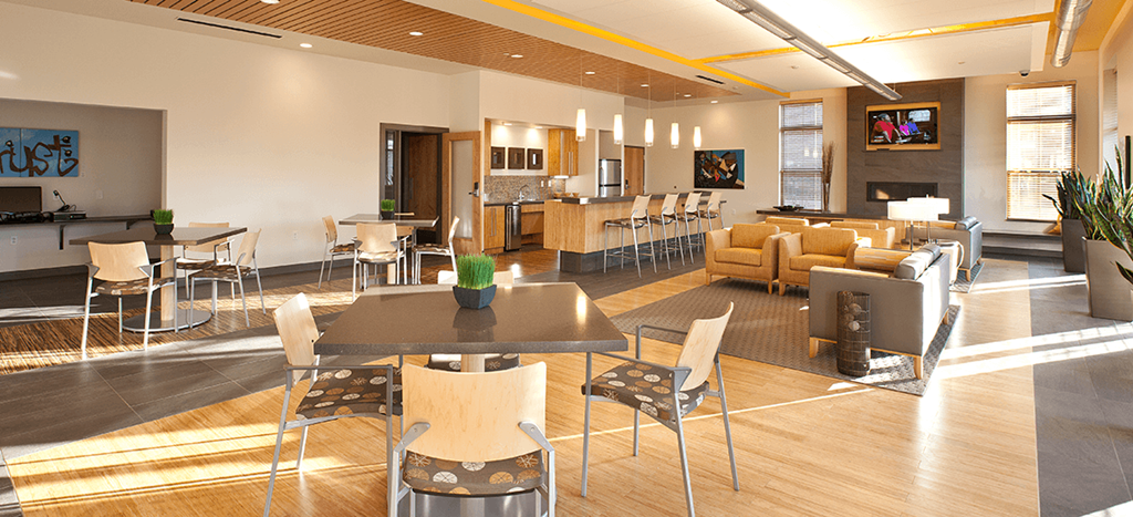 North Sarah Apartments clubhouse with tables and chairs