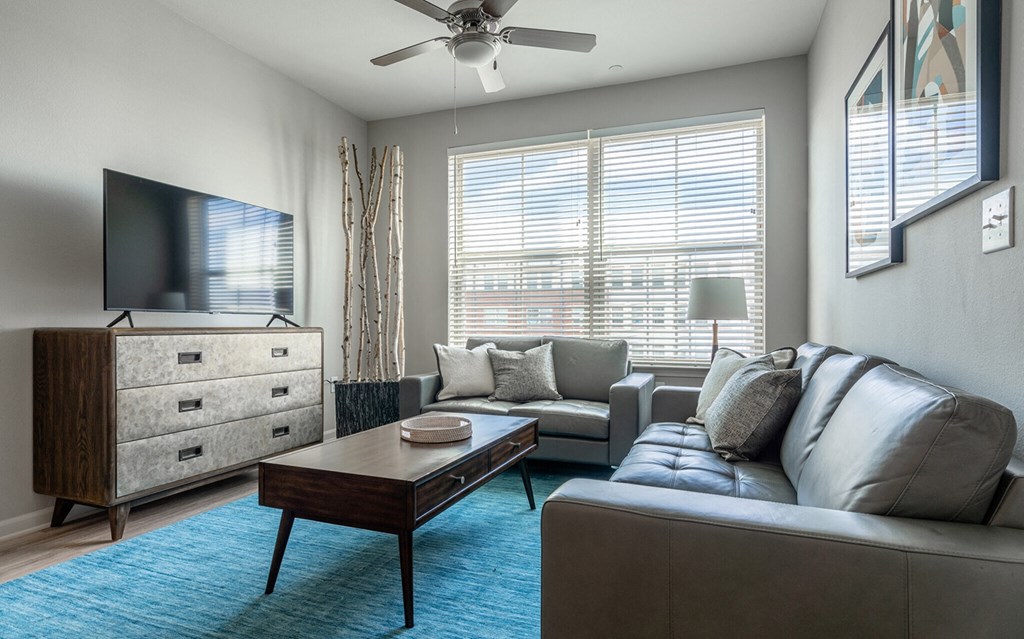 a living room with a couch and a coffee table
