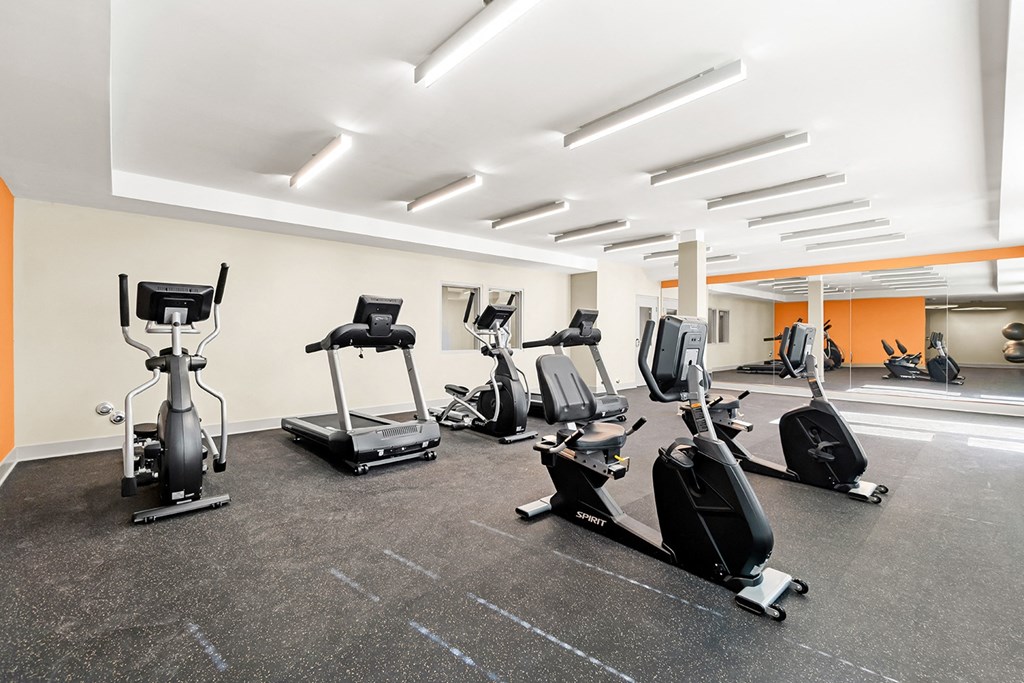 a gym with cardio machines and weights on the floor at South City Senior in Memphis, TN