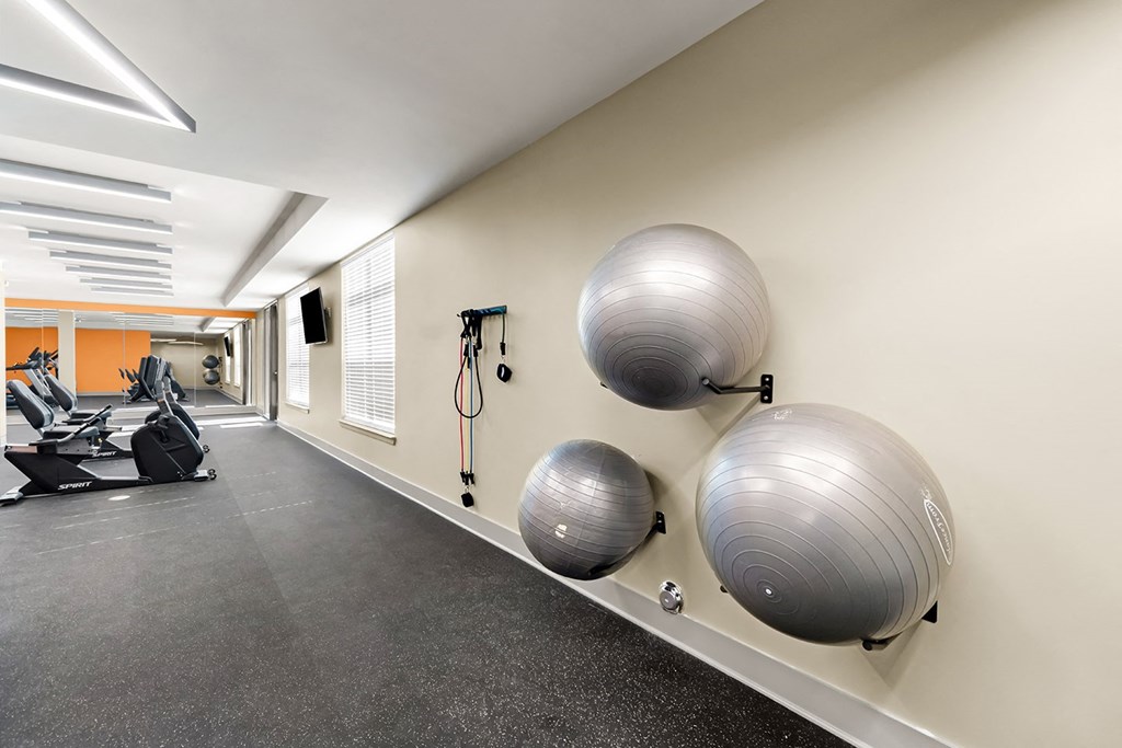 A fitness center with exercise balls and cardio equipment at South City Senior in Memphis, TN