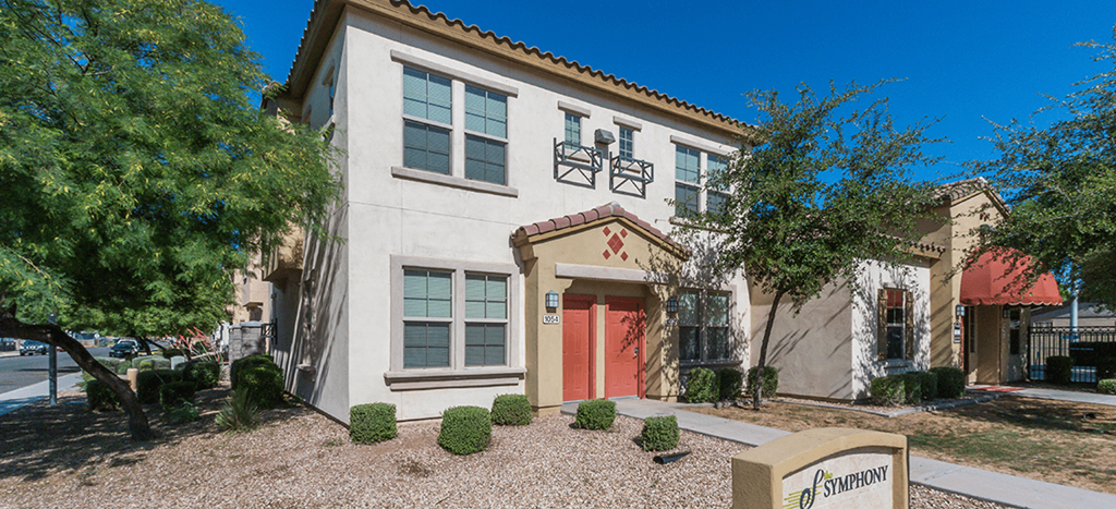 Apartment homes with red doors at The Symphony Apartments