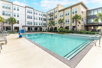 The swimming pool at Villas on the Strand apartments in Galveston, TX