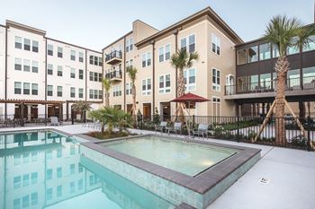 The swimming pool at Villas on the Strand apartments in Galveston, TX
