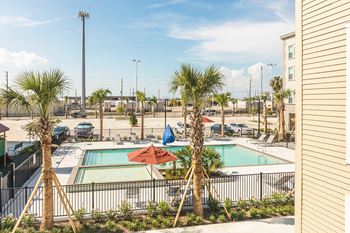 The swimming pool at Villas on the Strand apartments in Galveston, TX