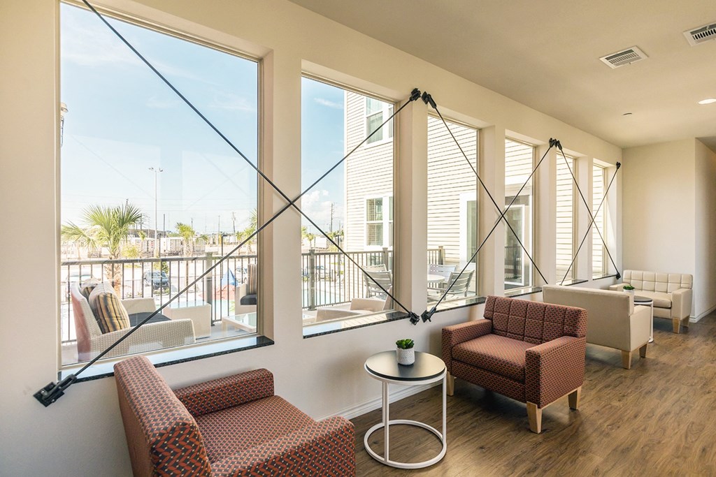 a living room with couches and a table