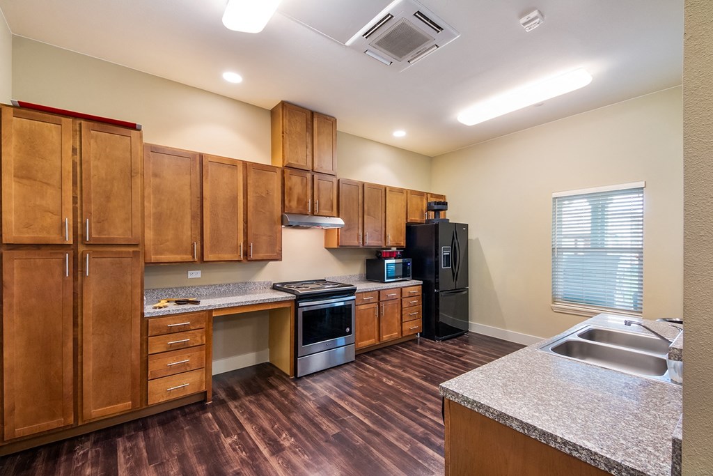 the preserve at ballantyne commons apartment kitchen with stainless steel appliances