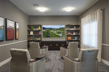 a waiting room with chairs and a window with a view at Wheatley Senior Living San Antonio