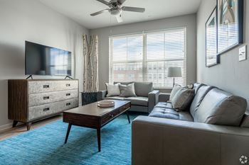 a living room with a couch and a coffee table