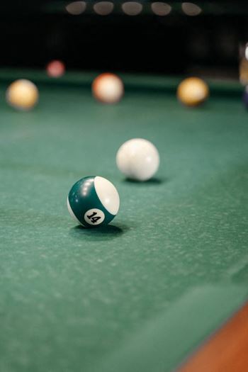a billiard ball on a pool table