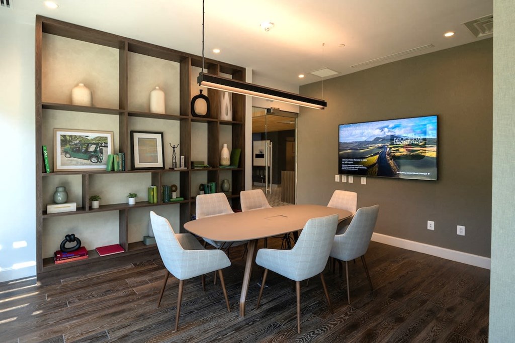 a dining room with a table and chairs at Sinclaire on Seminary, Virginia, 22311
