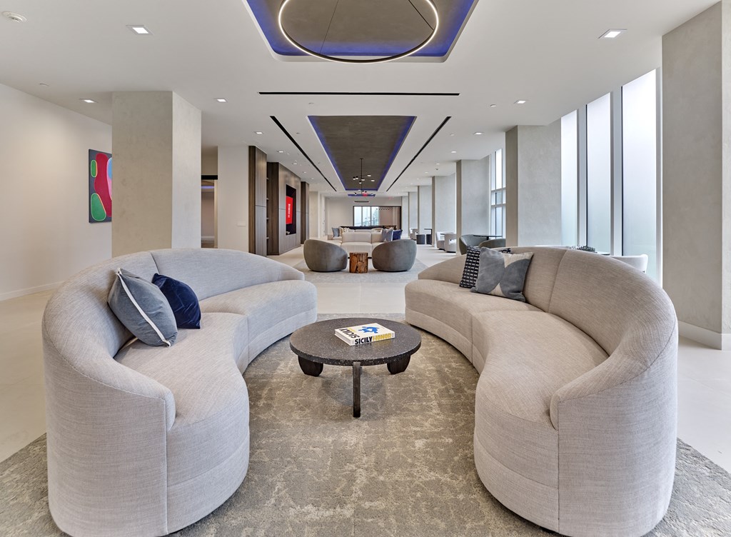 a large living room with two large couches and a coffee table