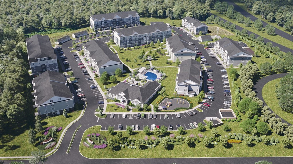 an aerial view of a large estate with several buildings and a swimming pool
