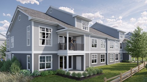 A modern two-story house with a balcony and multiple windows.