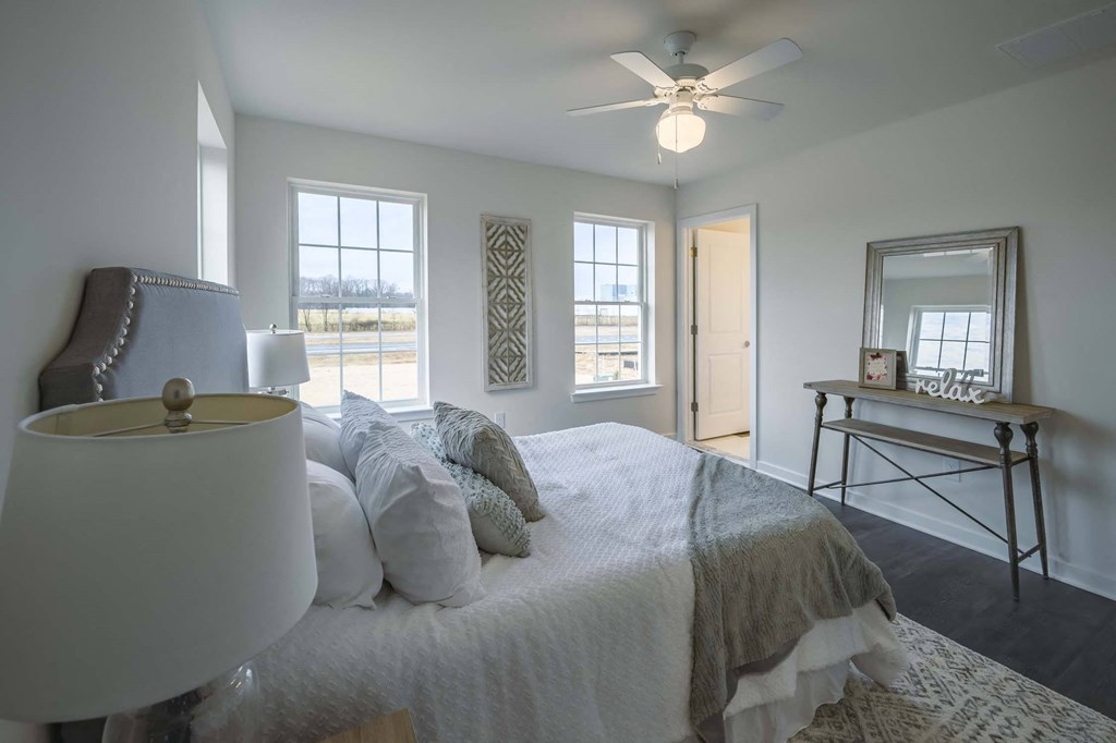 Primary bedroom with fan