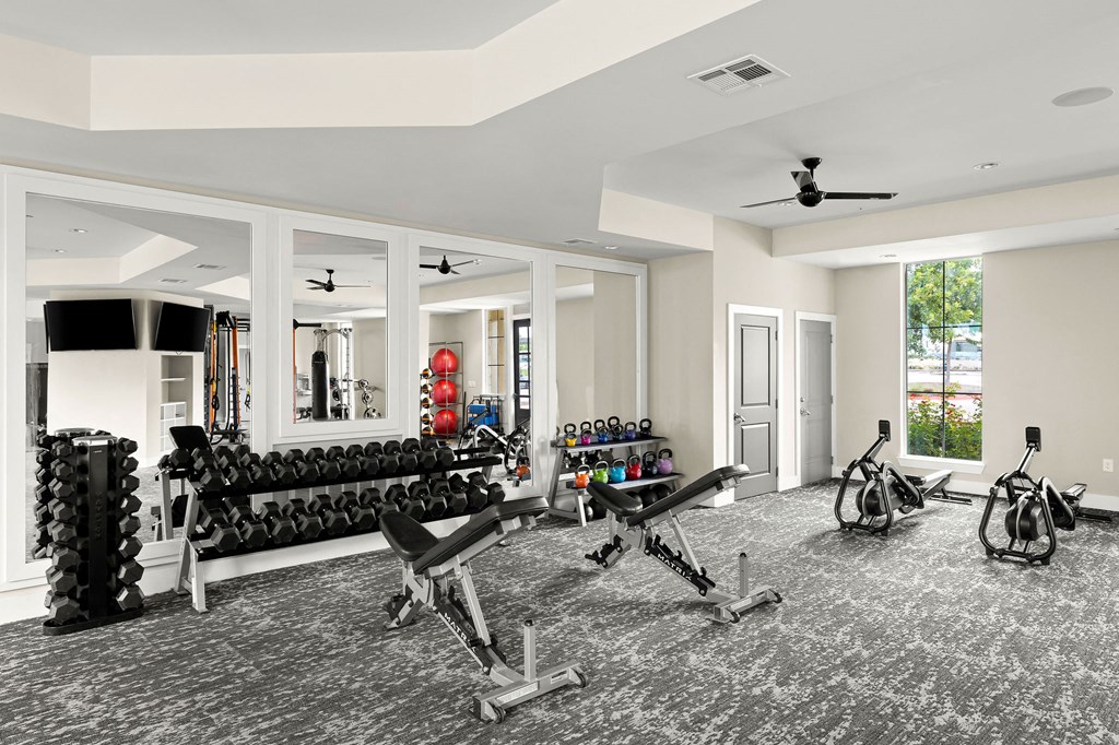 the gym at the monarch luxury apartments in des moines ia