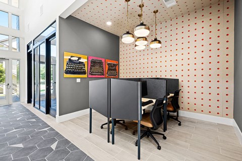 a dining area with a table and chairs in a room with a door