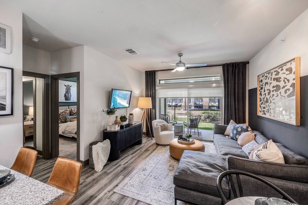 a living room with a couch and a tv