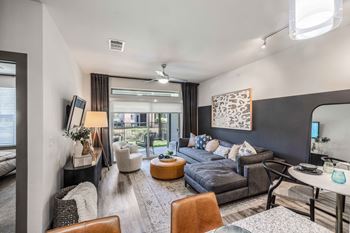 a living room with a couch and a table