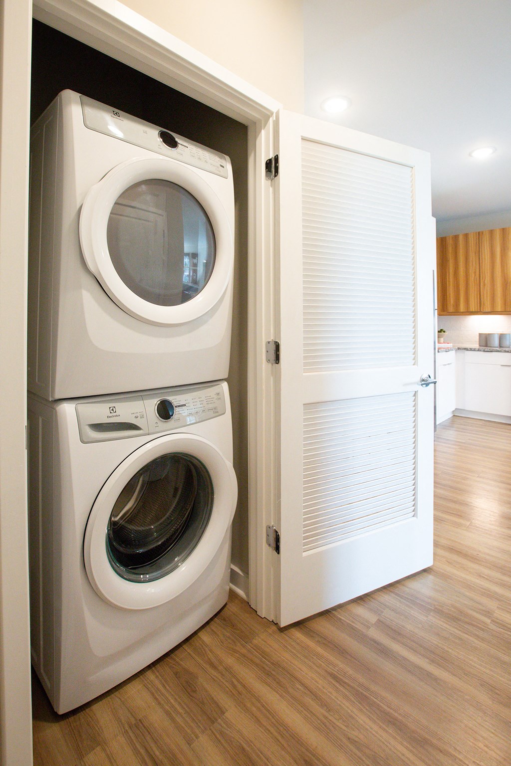 a small laundry room with a washer and dryer