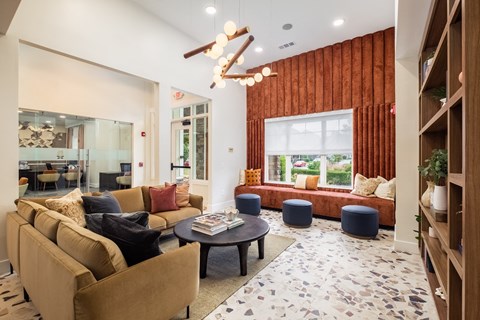 a living room with couches and a coffee table