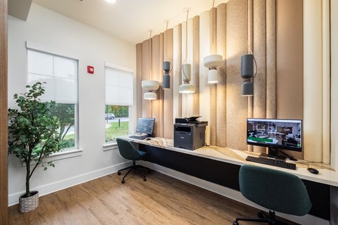a home office with a desk and a computer