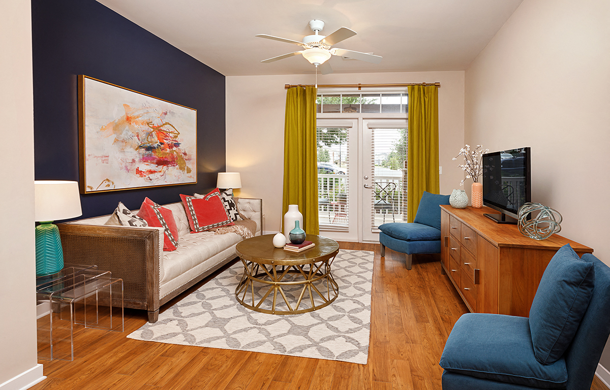 a living room with a couch and a tv
