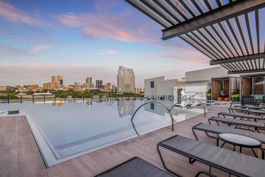 Rooftop Infinity Pool with Outdoor Lounge and Cabanas - Photo Gallery 1