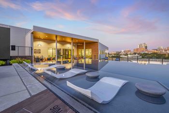 Rooftop Infinity Edge Pool with Outdoor Lounge and Cabanas