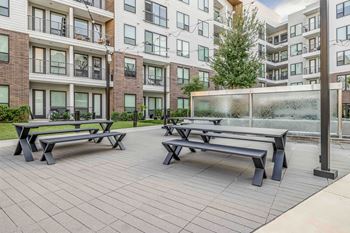 Courtyard Grilling and Picnic Area with Swings