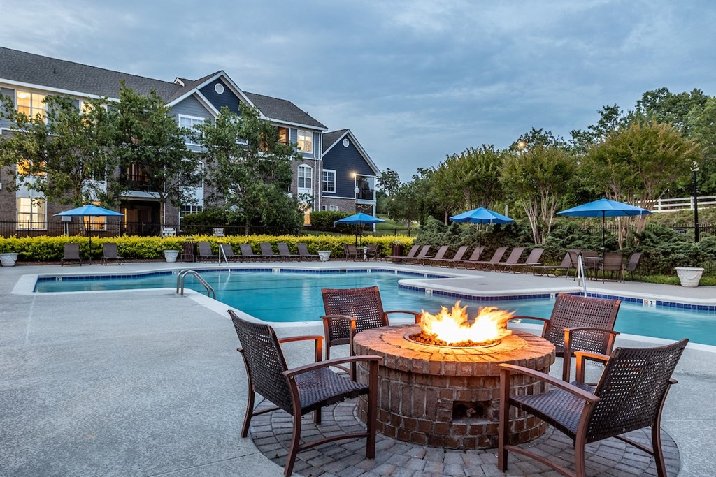 our apartments offer a swimming pool with a fire pit