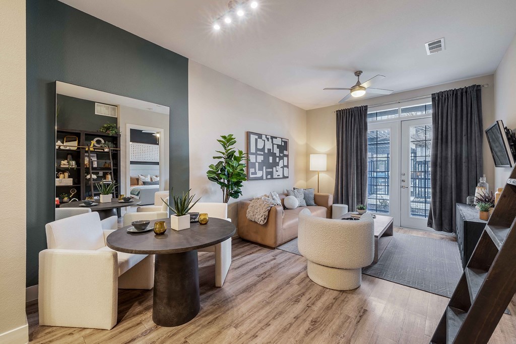 a living room with a couch and a table