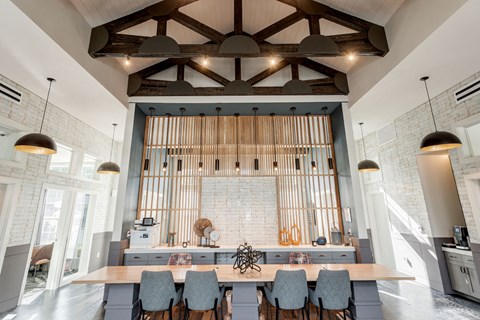 a large church organ in a kitchen with a table and chairs