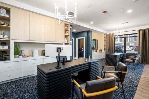 a conference room with a long desk and chairs