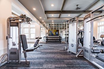 the gym at the enclave at woodbridge apartments in sugar land, tx