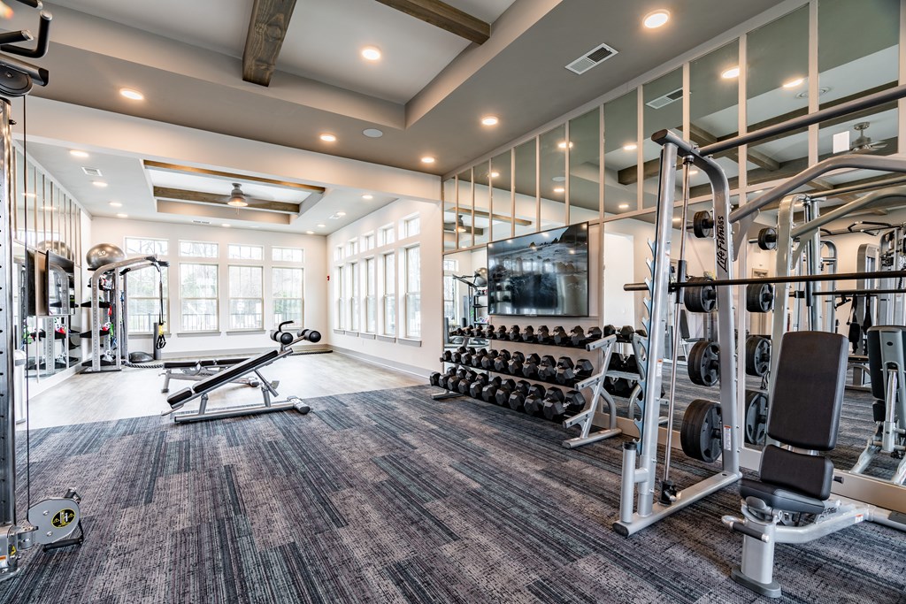 the gym at the enclave at woodbridge apartments in sugar land, tx