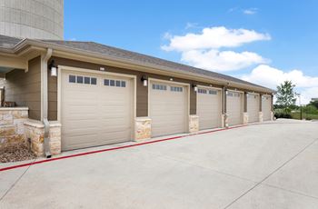 a row of garage doors on the side of a building