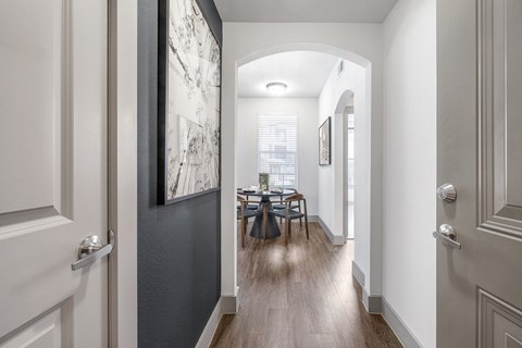 entry and foyer to the griffith model. large windows allow for natural light to fill the room.