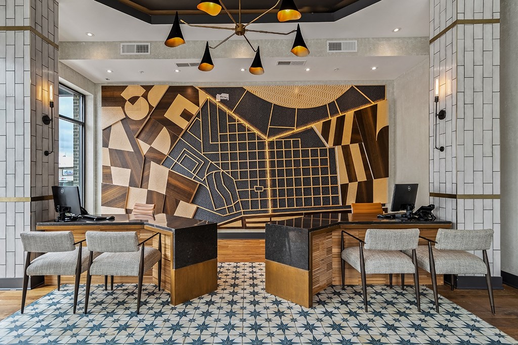 a rendering of a lobby with a desk and chairs