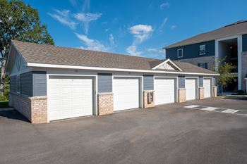 A two-story house with a garage.