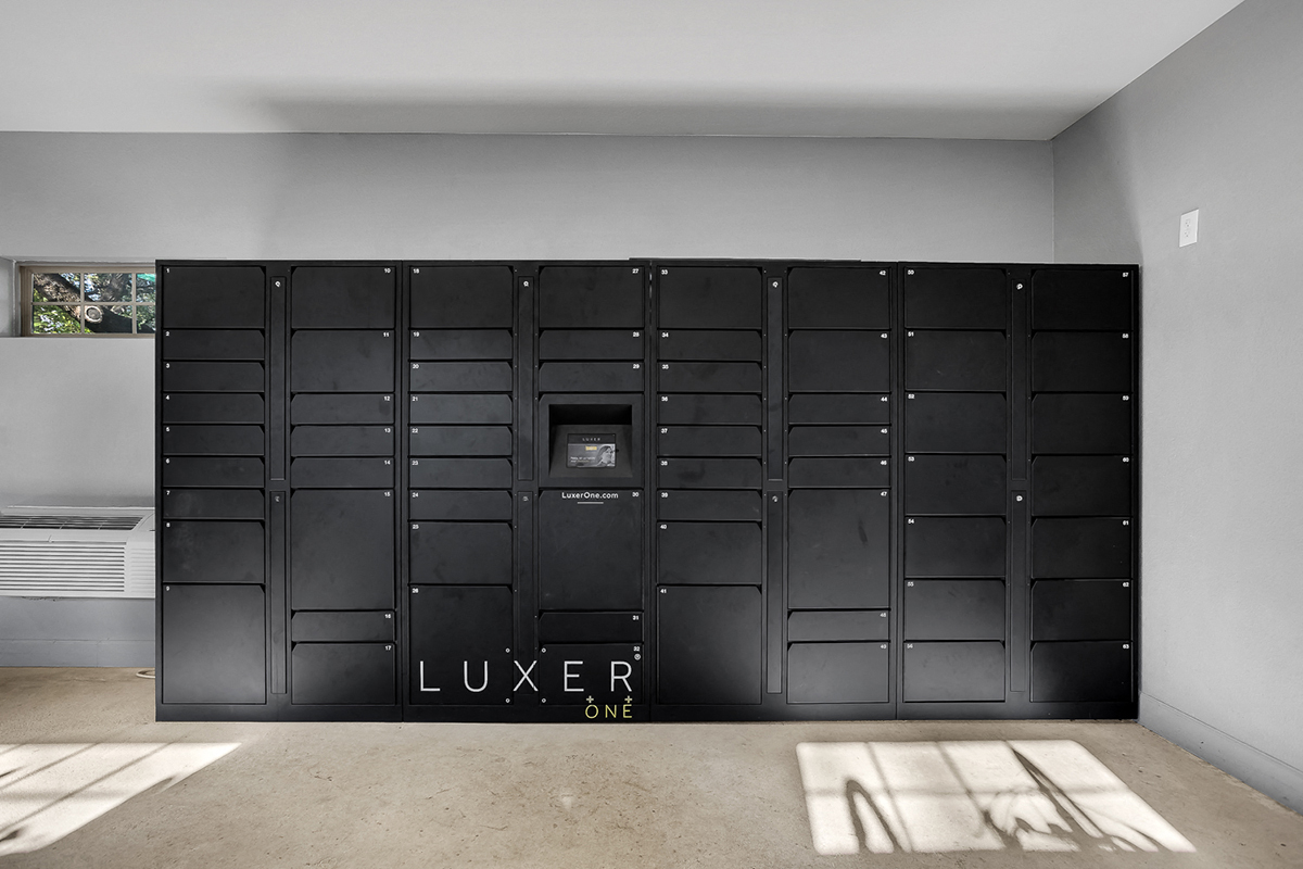 a large set of black lockers in a room