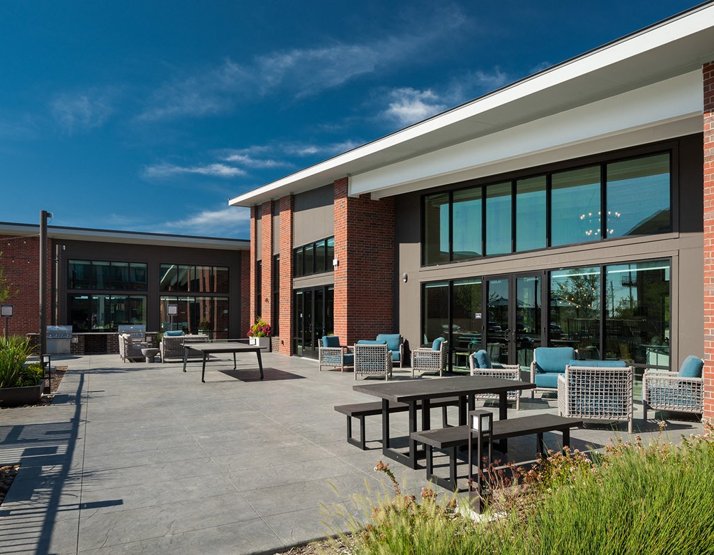 Poolside Outdoor Lounge with Fireplace and Grills
