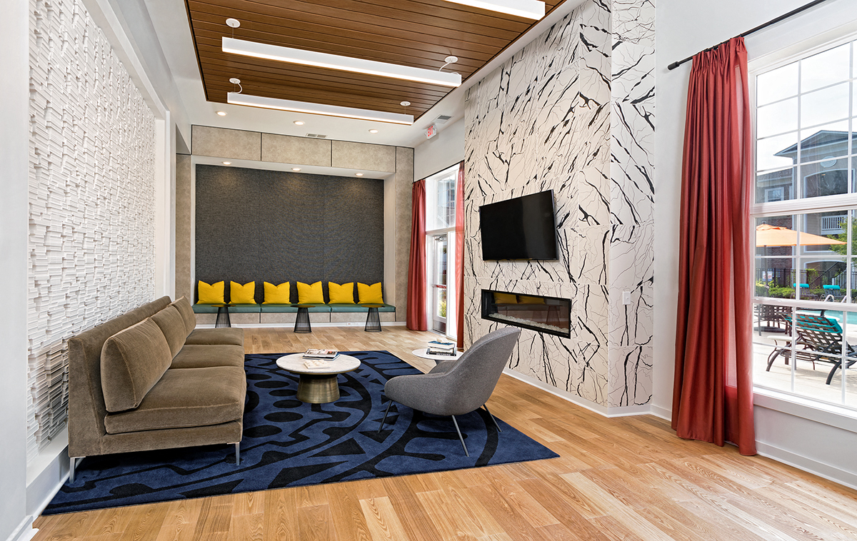 a rendering of a living room with a couch and a television