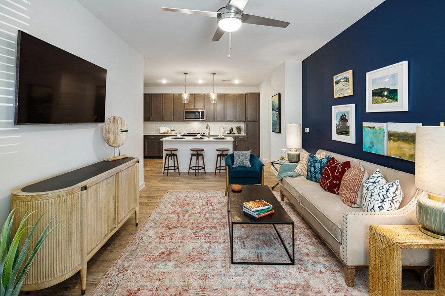 a living room with a couch and a table
