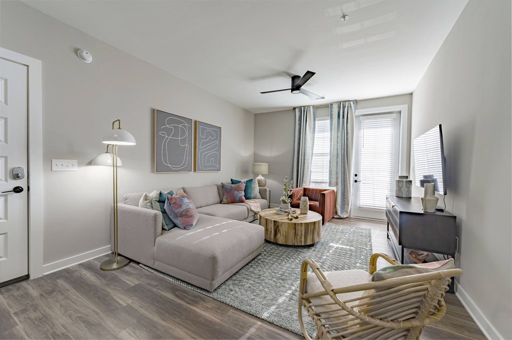 a living room with a couch and a tv