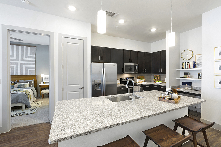 a kitchen with a counter top and a sink